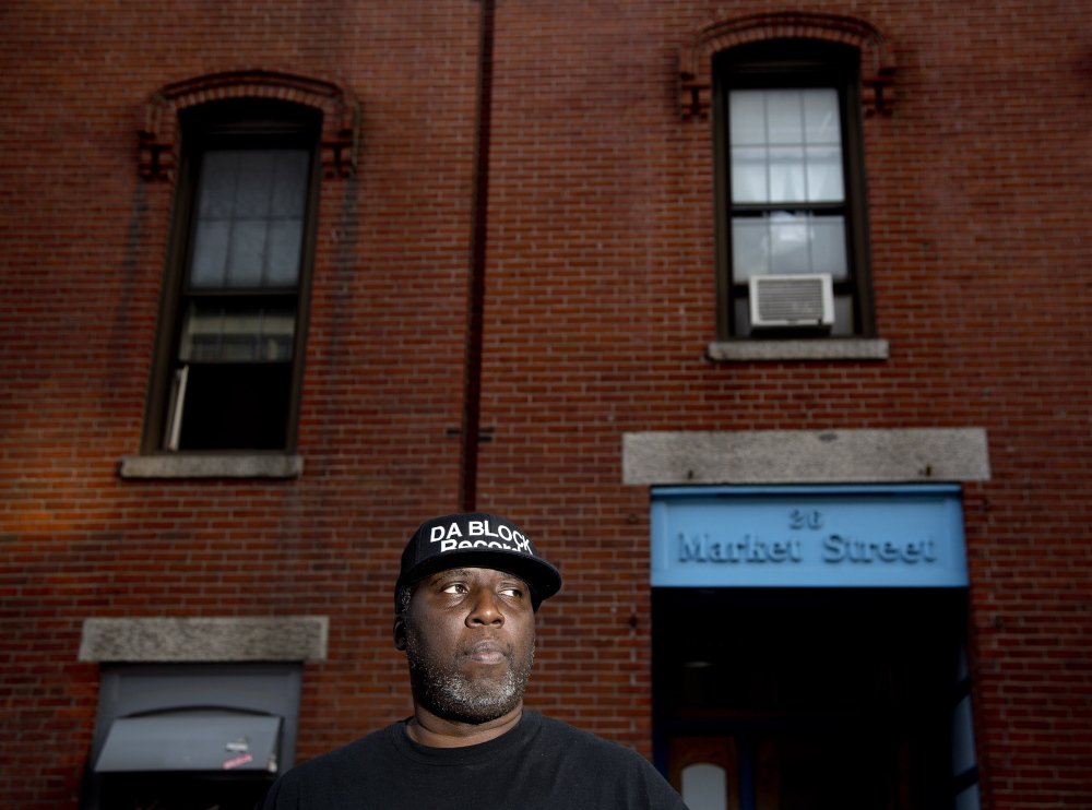Ron Hargrove, owner of Da Block Records, stands Tuesday outside 26 Market St., which houses his studio. He says people often use the space at night, but he never had trouble before Monday’s shootings. “The only thing going on in that studio is music.”