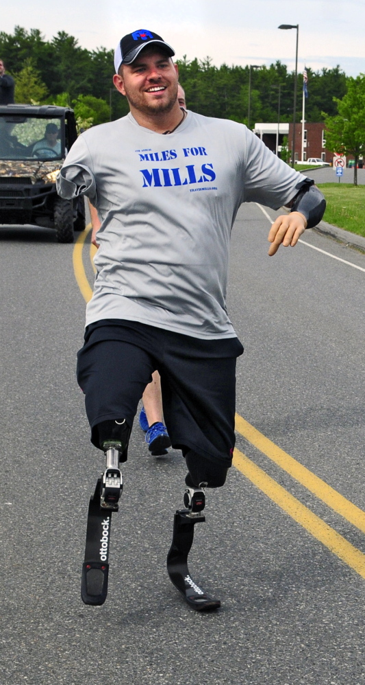 Travis Mills participates in the Miles for Mills 5K on Monday. Mills runs a nonprofit group that helps wounded veterans.
