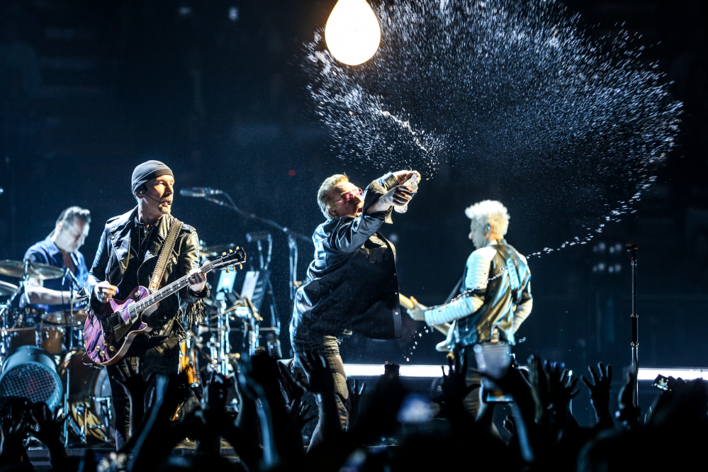 Larry Mullen Jr., from left, The Edge, Bono and Adam Clayton of U2 perform at the Innocence + Experience Tour at The Forum on Tuesday in Inglewood, Calif.