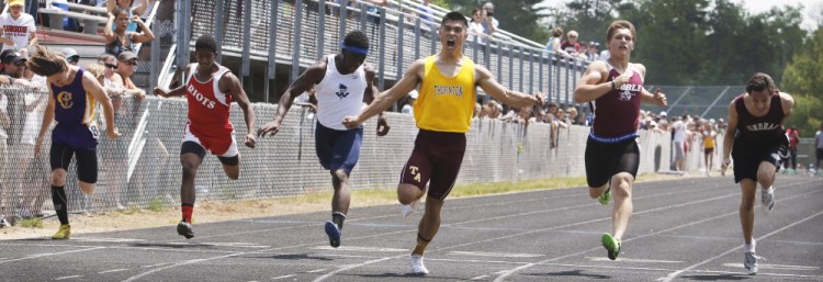 Derek Boissonault of Thornton Academy crosses the finish line Saturday to win the 100-meter dash, just ahead of Cam Johnson of Noble, in the SMAA outdoor track championships at North Berwick. The Thornton boys won the team title for the first time in 29 years. The girls’ team for the Trojans also captured a title.