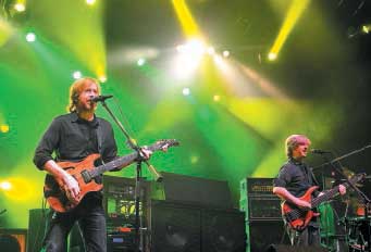 Trey Anastasio on guitar, left, and Mike Gordon on bass play in 2010 during a Phish concert at the Augusta Civc Center. In recent years, the civic center has had trouble bringing big concerts to the city. File Photo/Kennebec Journal