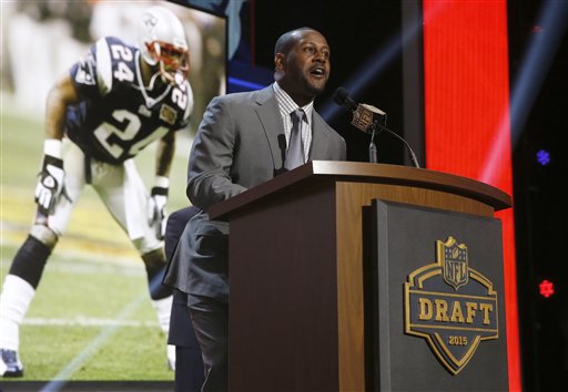 Former New England Patriots cornerback Ty Law announces the Patriots' selection of  Stanford's Jordan Richards as the 64th pick in the second round of the 2015 NFL Football Draft on Friday in Chicago. The Associated Press
