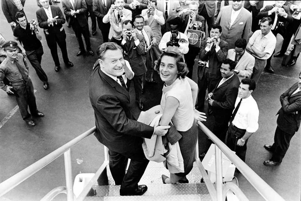 New York Gov. Nelson  Rockefeller and the former Margaretta F. Murphy land at Caracas, Venezuela, in this May 5, 1963,, photo. The Associated Press