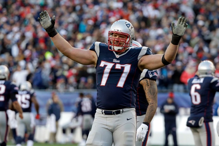 New England Patriots tackle Nate Solder reacts in the second half of a game against the Miami Dolphins in Foxborough in this Dec. 14, 2014, photo. The cancer diagnosis and his recovery deepened Solder's religious beliefs and gave him greater appreciation for friends and family. The Associated Press