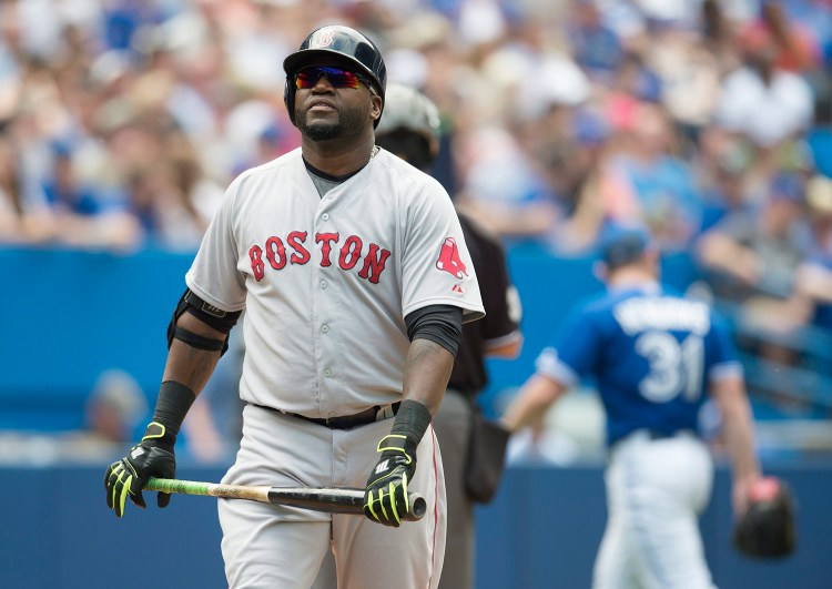 Red Sox designated hitter David Ortiz reacts after popping out to third base in the seventh inning against the Toronto Blue Jays in Toronto on Saturday. The Associated Press