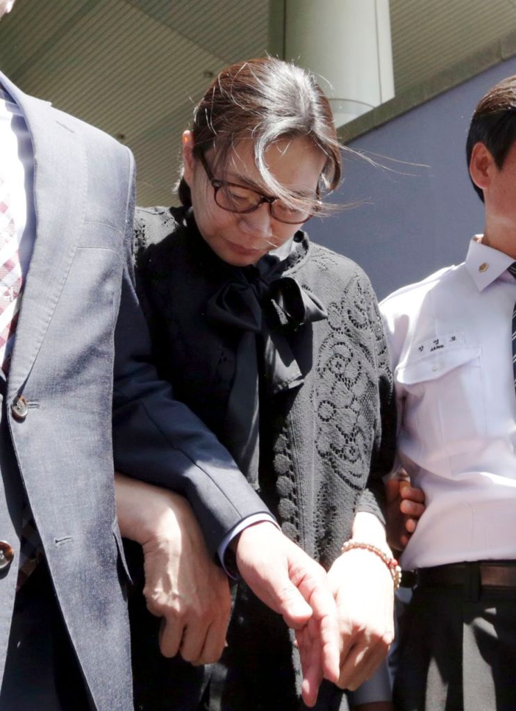Cho Hyun-ah, who is the daughter of Korean Air's chairman, leaves Seoul High Court Friday. The Associated Press