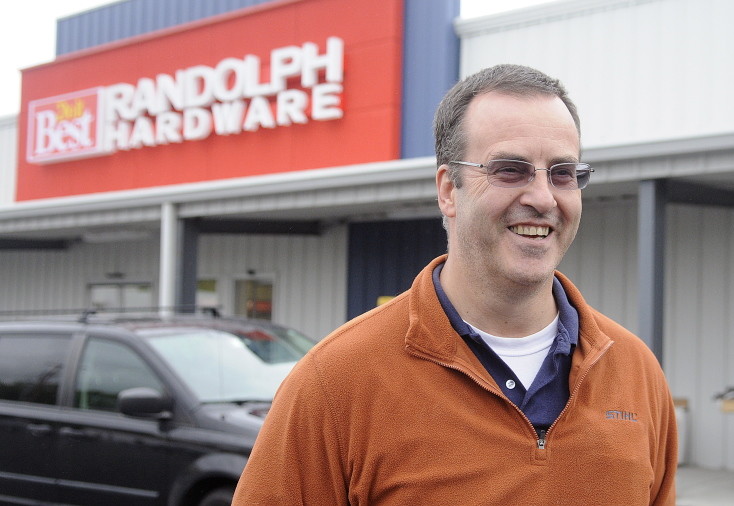 Robert Gardiner at his new business, Randolph Hardware, on Tuesday in Randolph, where the store’s location in the federal floodplain meant he had to spend more on construction.