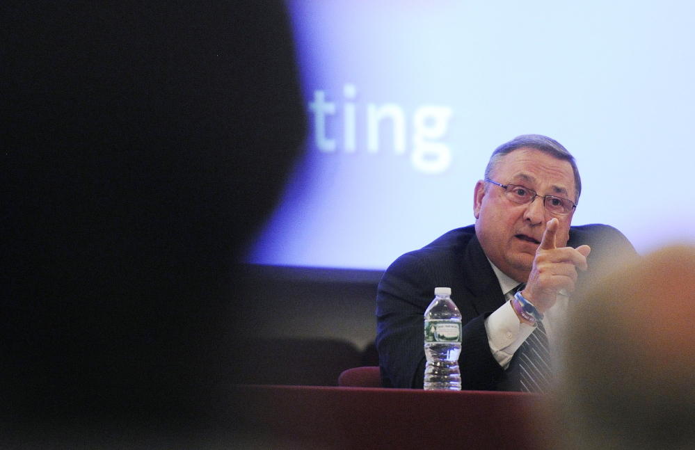 Gov. Paul LePage speaks at a town hall forum Tuesday at Open Door Bible Baptist Church in Lisbon. It was his tenth such session since February as he works to build public support for his plan to dramatically reform tax policy in the state.