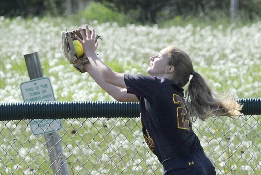 Kelly O’Sullivan of Cape Elizabeth makes a sensational catch, robbing a Greely hitter of a home run. Greely ended the regular season with a 13-3 record. Cape Elizabeth is 8-8 heading to the Western Class B tournament.