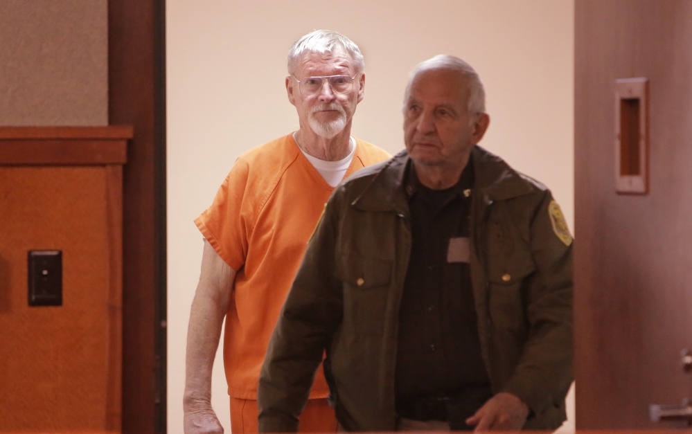 Merrill “Mike” Kimball enters the courtroom Friday for sentencing in the shooting death of Leon Kelley.