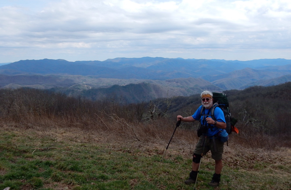 Carey Kish stands atop 5,000-foot Cheoah Bald in the Stecoahs of North Carolina on the Appalachian Trail. This section is part of the 531,000-acre Nantahala National Forest.