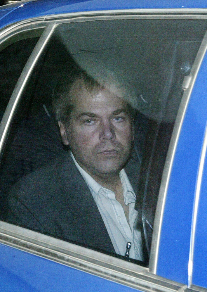 John Hinckley Jr. arrives at U.S. District Court in Washington in 2003. A federal judge is deciding whether to allow the man who shot President Reagan to live full-time outside the mental hospital that has been his home.