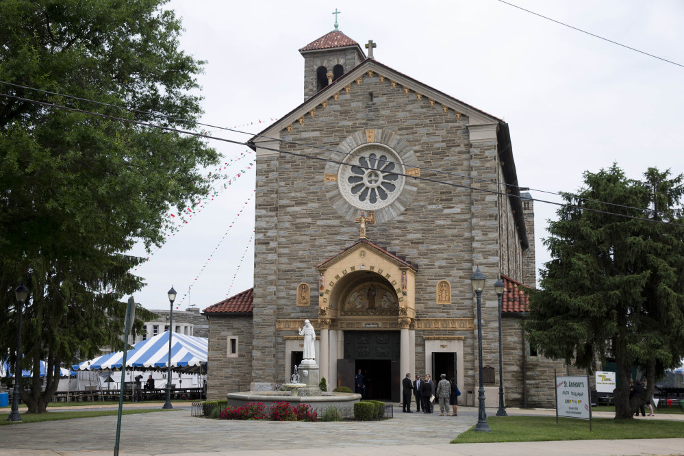 Mourners arrive at St. Anthony of Padua Roman Catholic Church in Wilmington, Del., on Saturday before a funeral for former Delaware Attorney General Beau Biden. Biden, the eldest son of the vice president, died of brain cancer May 30 at age 46.