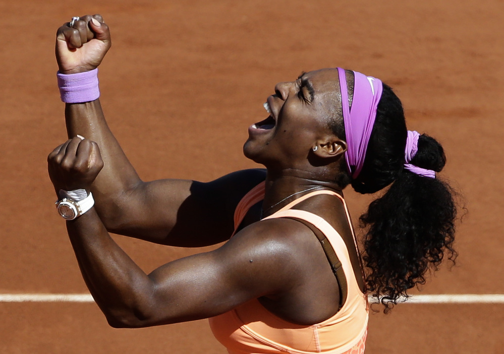 Serena Williams celebrates after defeating Lucie Safarova for the French Open women’s singles title Saturday in Paris. Williams won 6-3, 6-7 (2), 6-2.