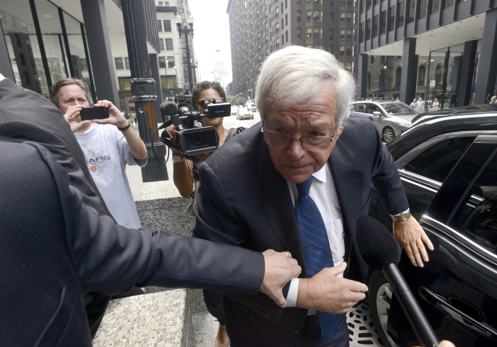 Former House Speaker Dennis Hastert arrives at the federal courthouse Tuesday in Chicago for his arraignment on federal charges that he broke federal banking laws and lied about the money when questioned by the FBI.