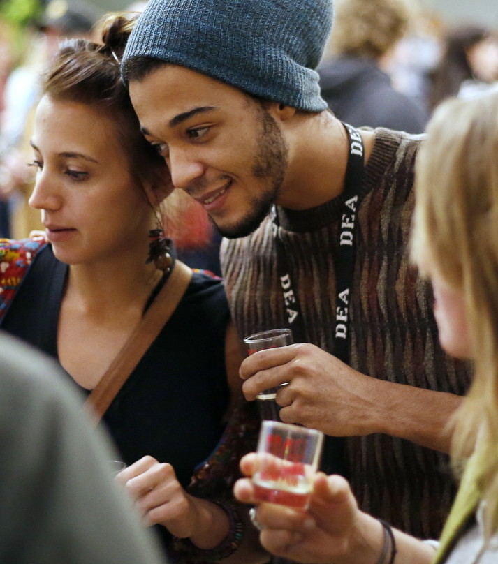 Gabrielle Roos and Brandon Williams at a cider-tasting pop-up event in Portland to generate buzz for Maine Fare 2015, which will take place June 26-27 in Camden. Derek Davis/Staff Photographer