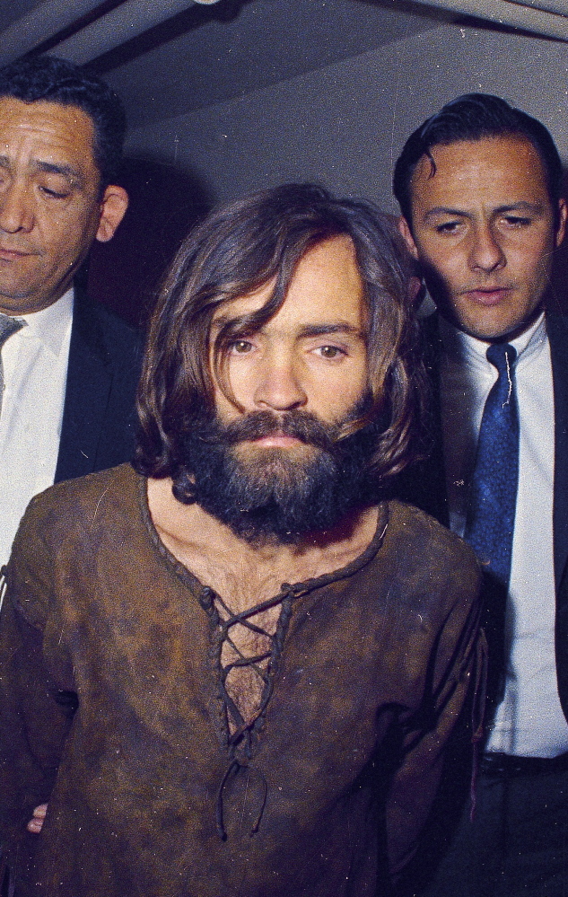 Charles Manson, shown being led to his arraignment in 1969, remains in prison decades after the slayings that shocked the nation.