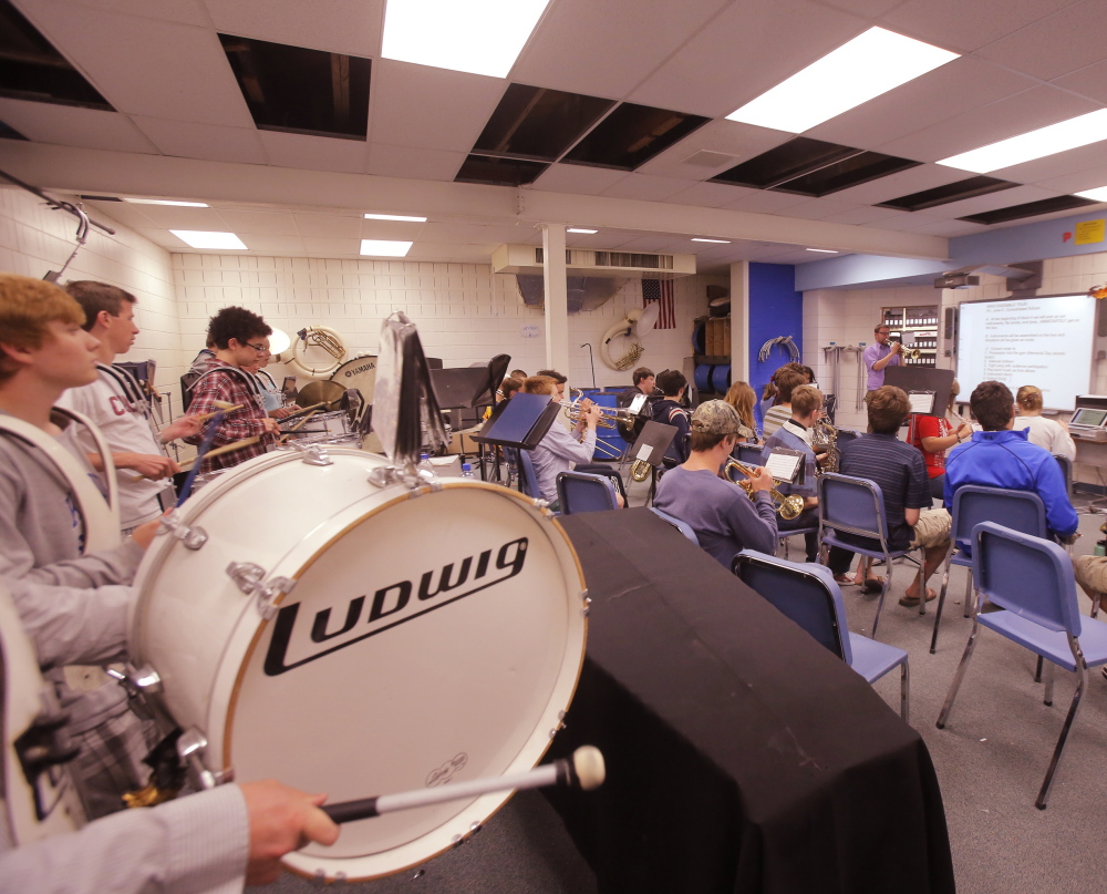 Part of the Kennebunk High School band rehearses in the band room at the school. Voters passed a $56.5 million bond Tuesday for a series of renovations that will give the band enough space to practice together, among other projects in three schools in RSU 21.