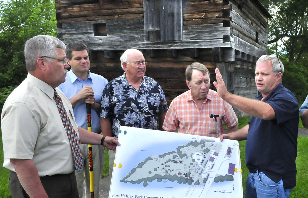 Winslow officials and committee members discuss the Fort Halifax improvement project that will begin this summer. The $193,000 project will include relocation of the parking lot and trails to enhance the historic site. From left are Town Manager Mike Heavener, Jim Bourgoin, Ken Fletcher, Gerald St. Amand and Ray Caron.