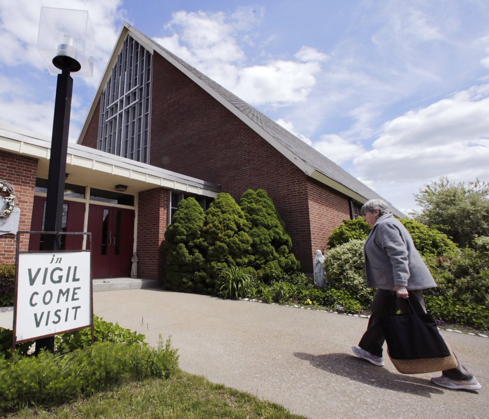 Protesters want the Archdiocese of Boston to either restore the parish’s standing at the former St. Frances Cabrini Church in Scituate, Mass., or let them purchase the building outright.