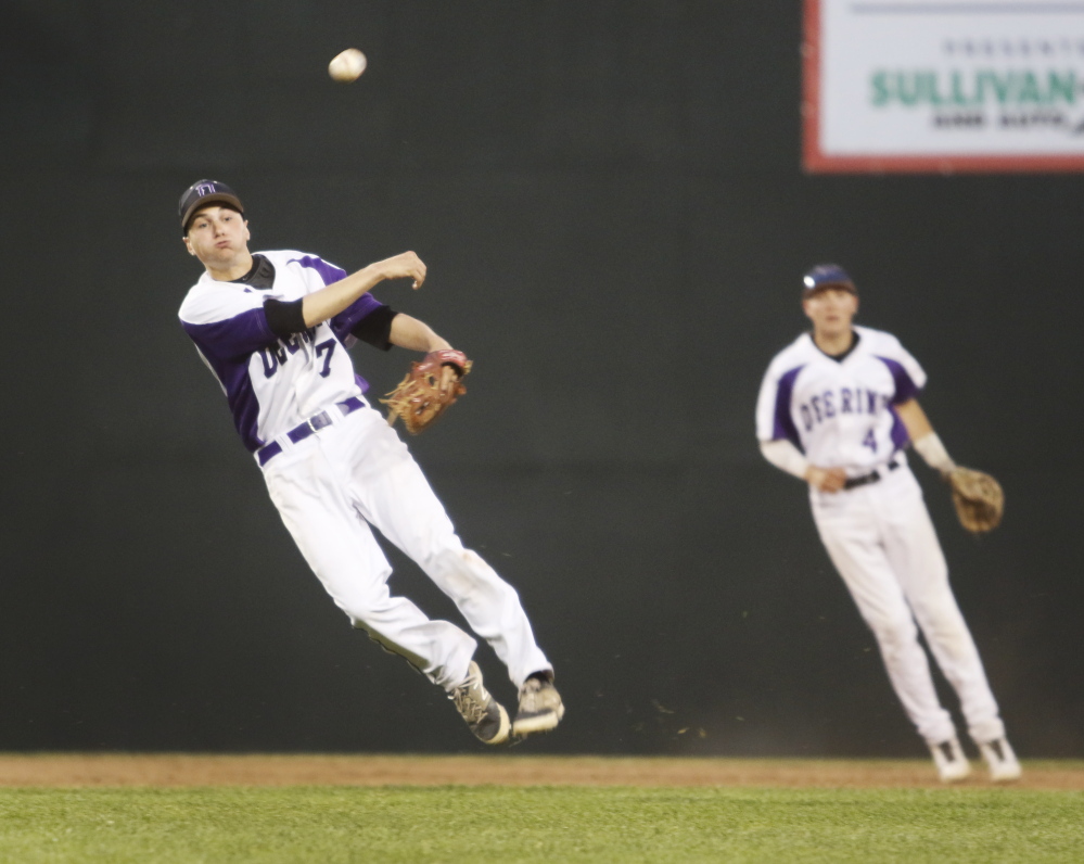 Nick Bevilacqua of Deering fires to first base to end the sixth inning. Portland will take a 13-4 record to the semifinals, while ninth-seeded Deering ended its season at 11-7. Jill Brady/Staff Photographer
