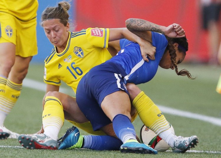 Sweden’s Lina Nilsson (16) hauls down the United States’ Sydney Leroux during the second of half Friday’s Women’s World Cup soccer match, which ended 0-0.