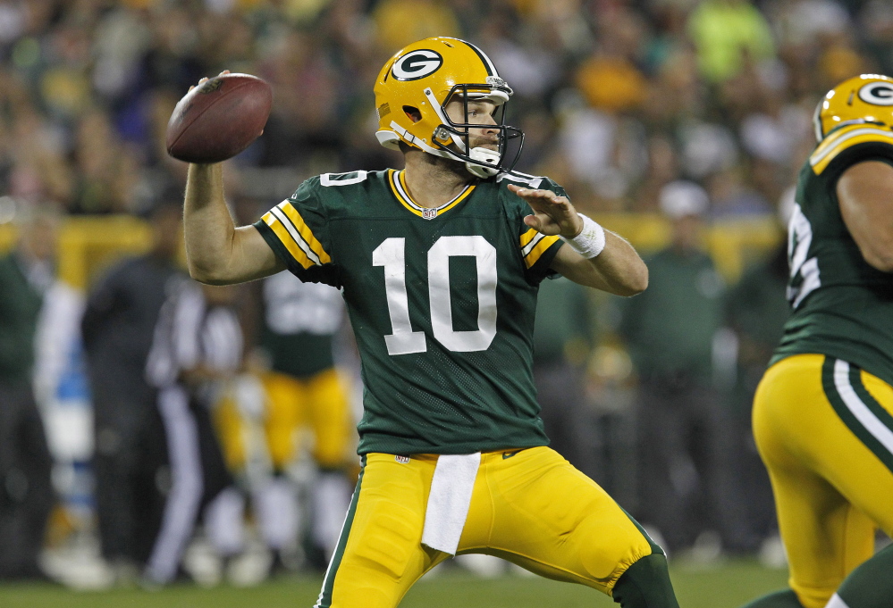 Quarterback Matt Flynn, who started his career with the Packers, was signed Friday by the Patriots to shore up the position with Tom Brady facing a four-game suspension.