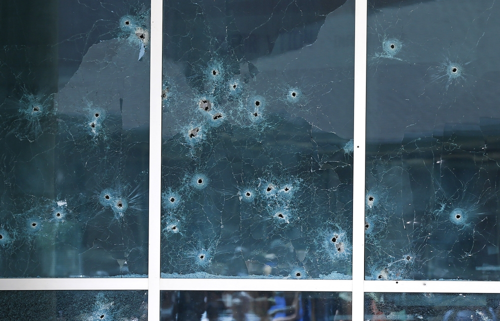 Bullet holes in windows at Dallas Police headquarters.