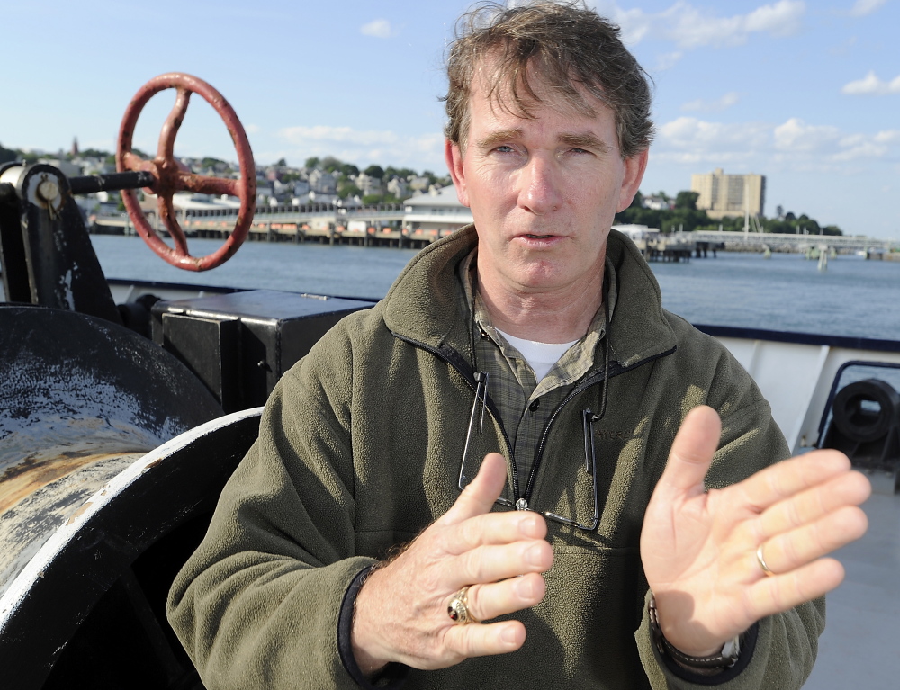 Michael C. Hurley of Charleston, S.C., describes how his 30-foot sailboat was heeling over during a storm and taking on water before he was rescued by the crew of a Maine Maritime Academy training ship.