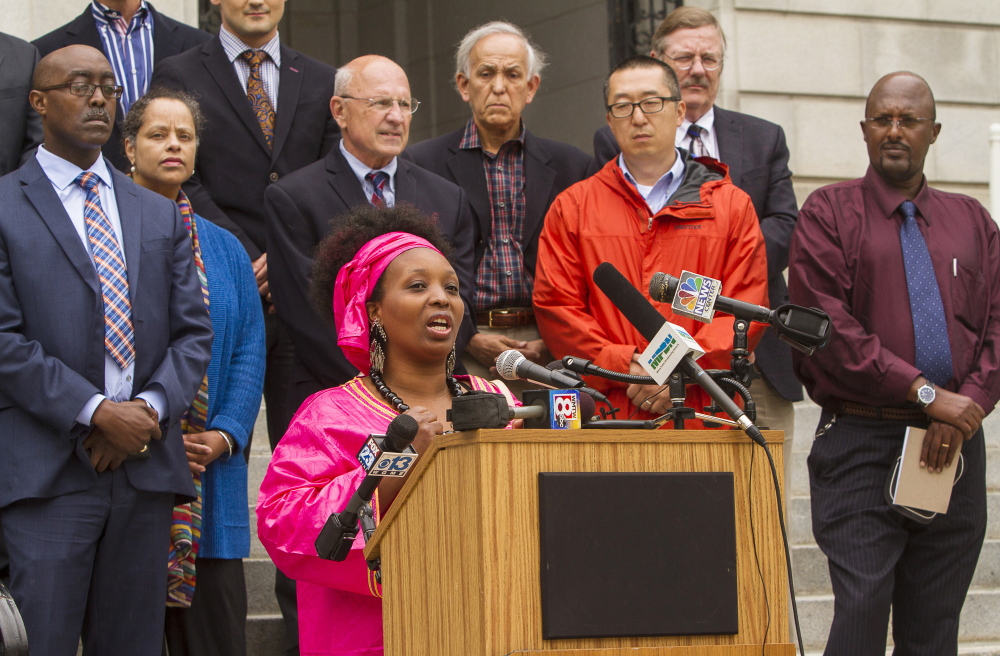 Aimee Nyirakanyana, owner of the Ebenezer African Grocery Store, speaks during a news conference Monday to advocate for lawmakers to support the General Assistance legislation that would assist asylum seekers.