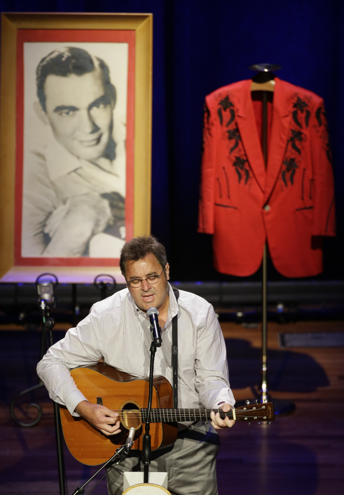 Vince Gill performs during the funeral service for country music performer Jim Ed Brown.