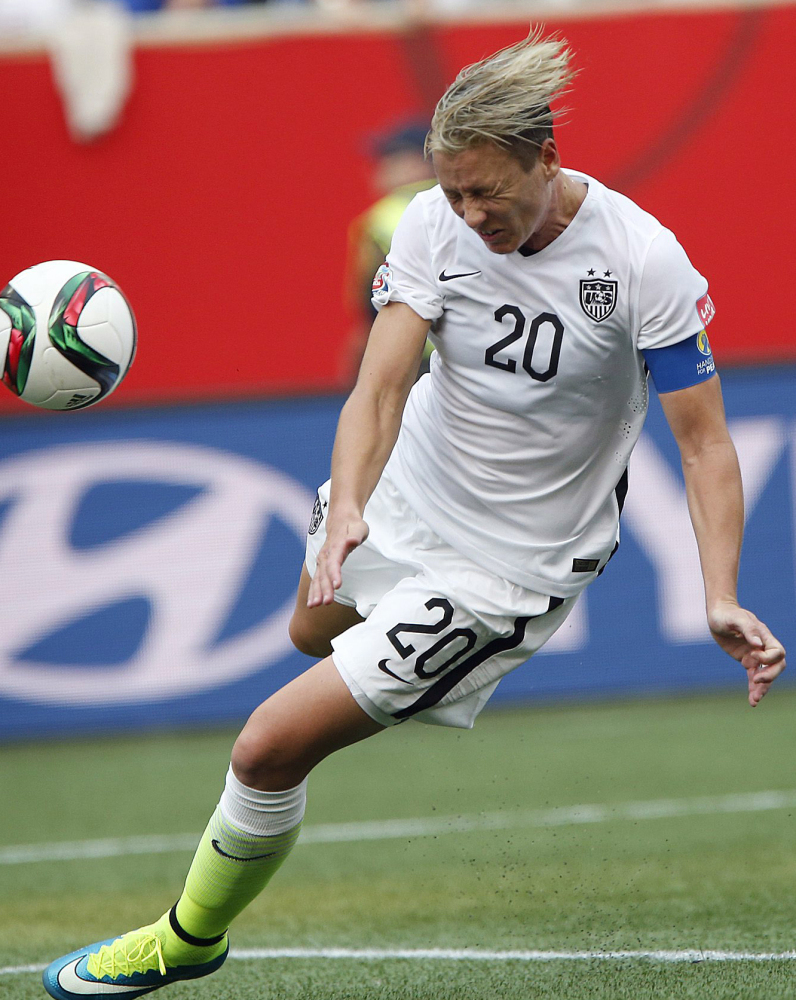 Abby Wambach, who is being used as both a starter and a sub, believes she’d have more goals if the Cup were played on grass.