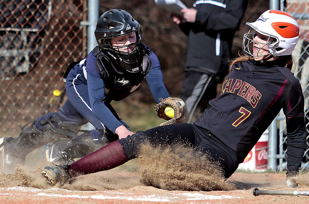 Catcher Kallie Hutchinson, left, is one of two seniors on a Yarmouth team that bounced back from a tough loss in the regional semis last year to earn a berth in the final this year. 