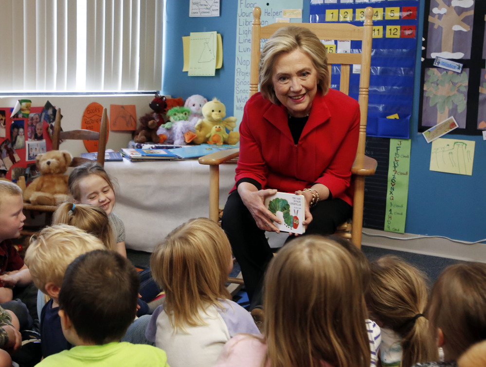 Democratic presidential candidate Hillary Rodham Clinton meets with a group of preschoolers during a campaign stop Monday in Rochester, N.H. She said, “You shouldn’t think of childcare as just a place to deposit your kids.”