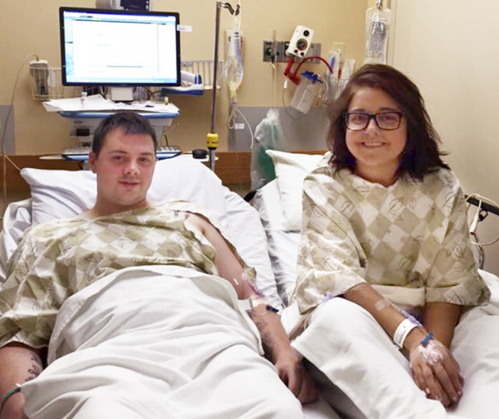 Kidney donor Josh Dall-Leighton of Windham and recipient Christine Royles of South Portland await surgery Tuesday at Maine Medical Center.