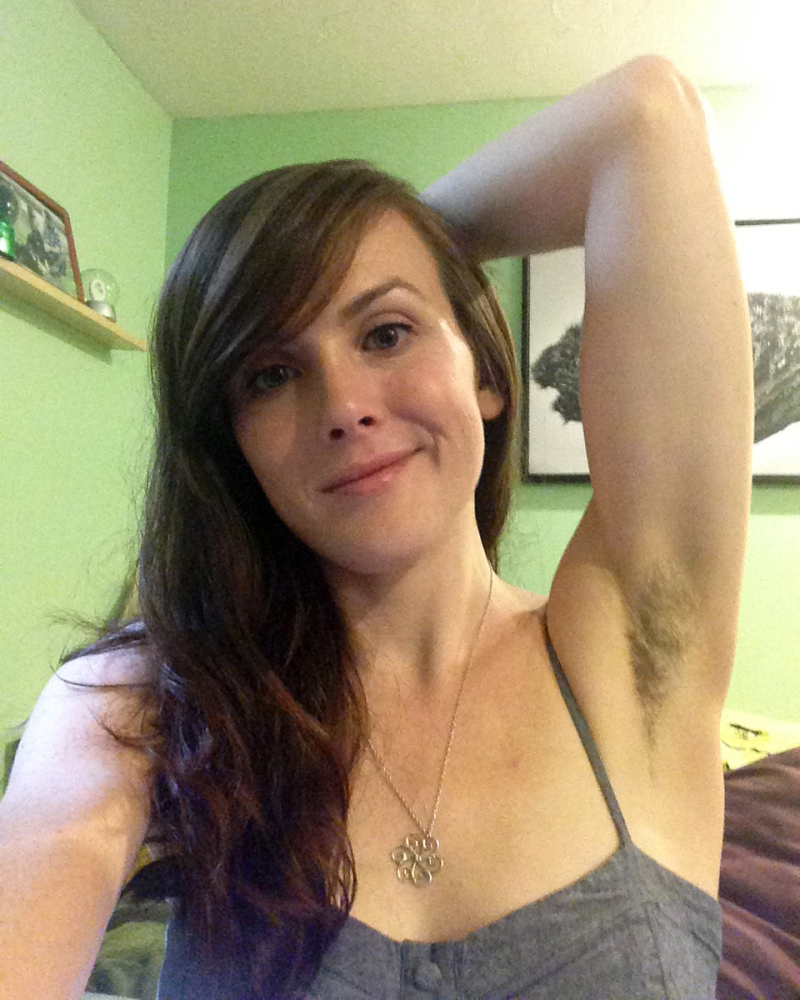 Katherine Anne True shows off her unshorn armpits at her home in Raynham, Mass. “I started it a few months ago before I knew it was a trend,” said True, 30.