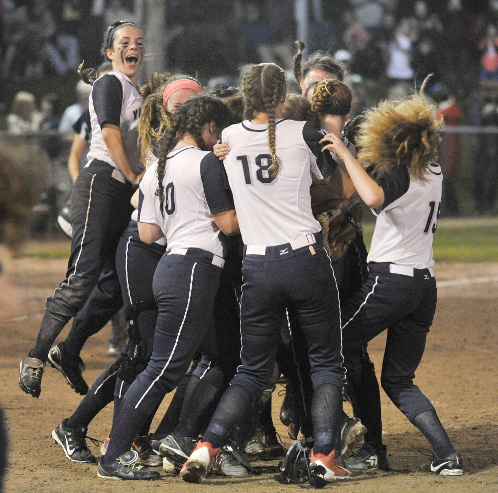 It’s time to celebrate for Yarmouth, which shut out Fryeburg 1-0 Tuesday for the Western Class B softball title. The Clippers will play Hermon Saturday for the state title.