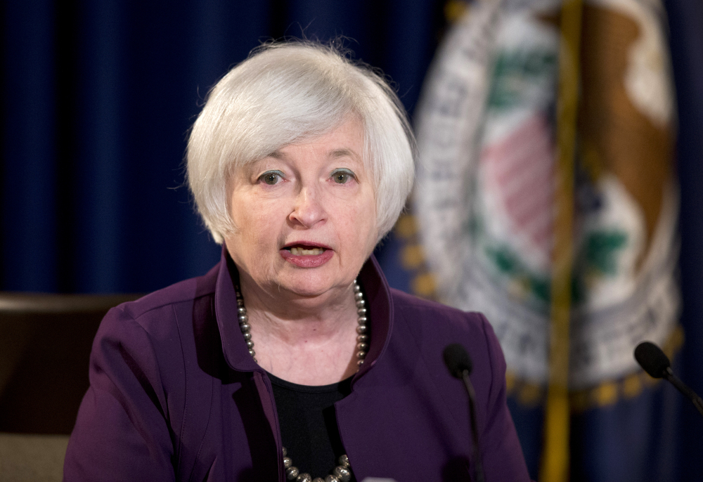 Federal Reserve Chair Janet Yellen speaks during a news conference in Washington on Wednesday. The Federal Reserve significantly lowered its estimate of economic growth this year.