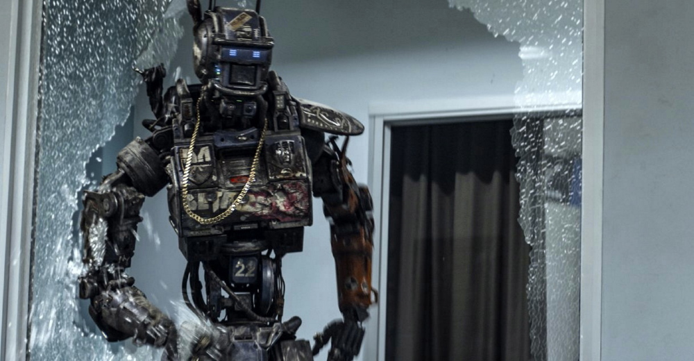 A police robot has the ability to process human thought and emotion in “Chappie”