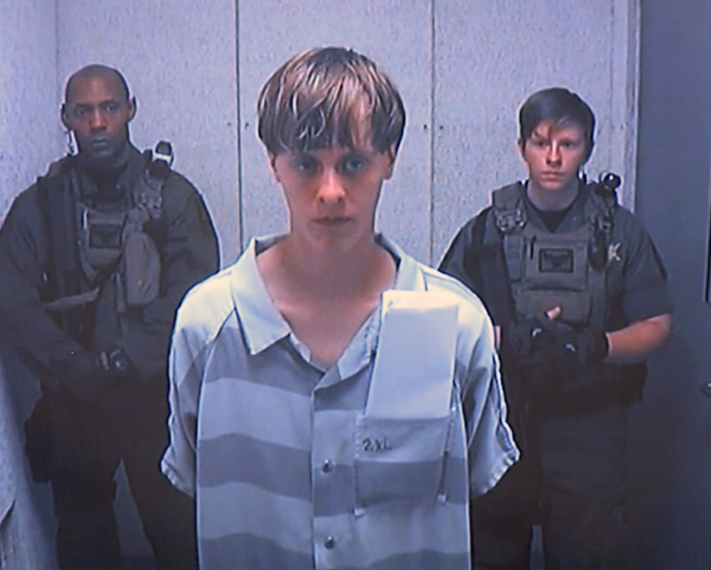 Dylann Roof, 21, appears via video before a judge in Charleston, S.C., on Friday. He is accused of killing nine people inside a black church in Charleston.