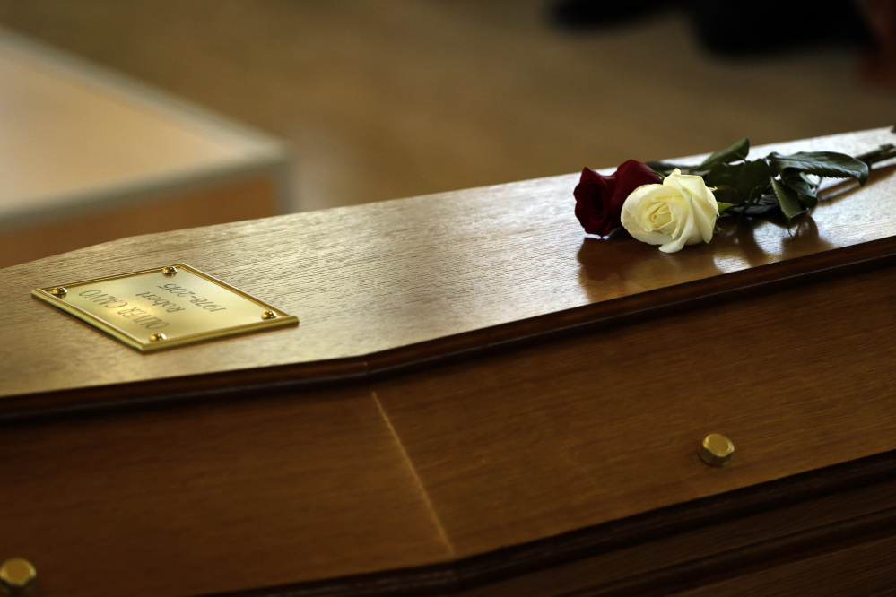 Flowers on top of a coffin with the remains of Robert Oliver Calvo, on a business trip when the Germanwings jet he was in crashed in the French Alps, during a religious funeral service in Montcada, near Barcelona, Spain, Saturday.
The Associated Press 