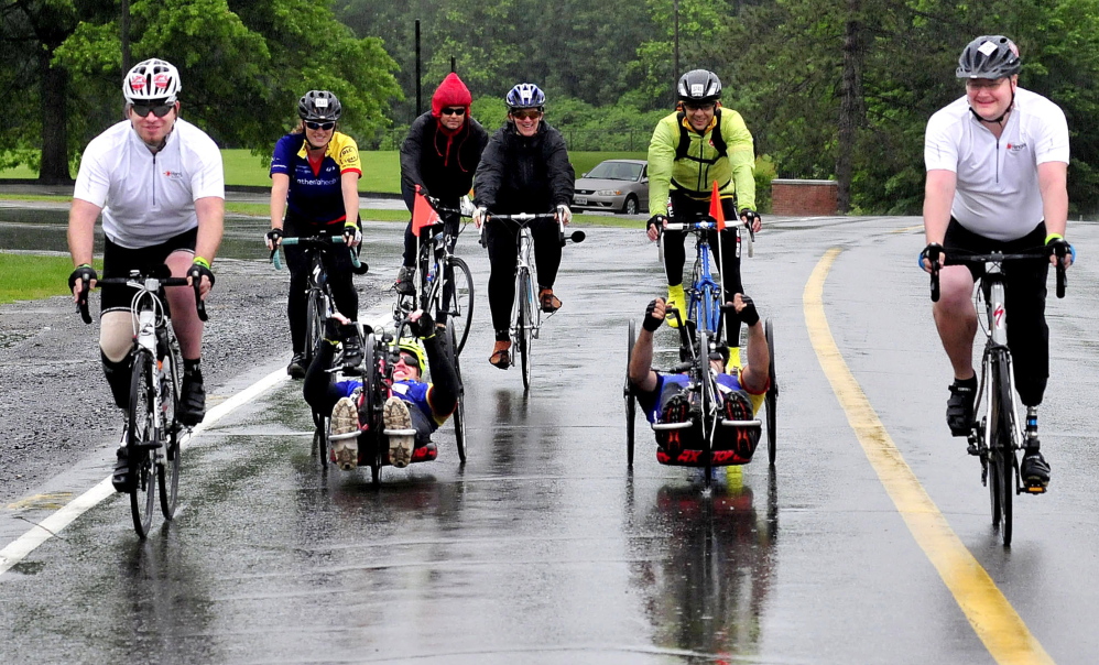 Team Maine Adaptive heads out on their Trek Across Maine.
In front from left are Patrick Brown of Pittsfield, Larry Nadeau and Kenny Young of Newry and Corey Hamilton of St. Albans.