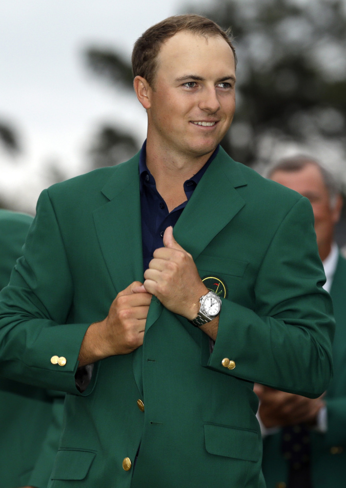 Jordan Spieth wears his green jacket after winning the Masters on April 21 in Augusta, Ga.