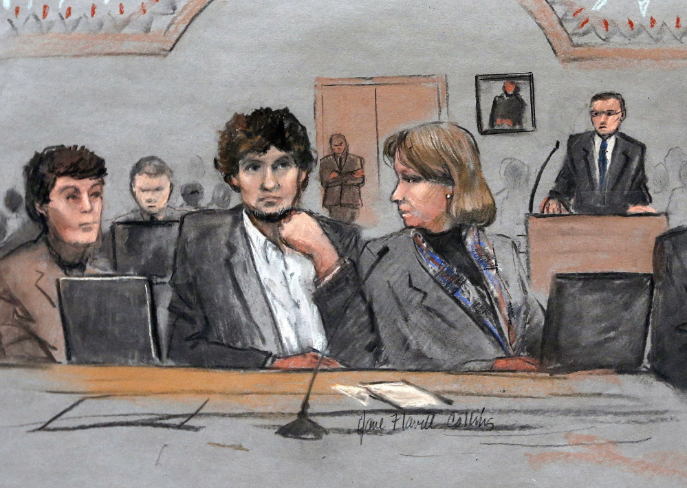 Dzhokhar Tsarnaev, center, depicted between defense attorneys Miriam Conrad, left, and Judy Clarke in March, is said to be remorseful, and if so, will have the opportunity to express his feelings during Wednesday’s formal sentencing of his execution.