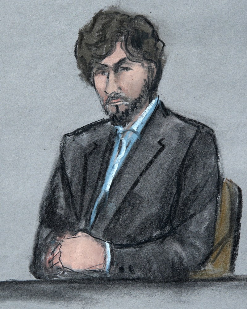 Boston Marathon bomber Dzhokhar Tsarnaev sits as survivors and victim’s family members address the court Wednesday. He told victims, “I pray for your relief, for your healing.”