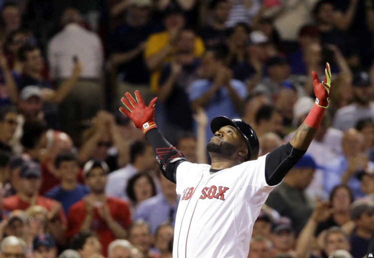 David Ortiz crosses the plate after hitting a two-run home run during Boston’s sixth-inning rally. The five-run inning was enough to give the Red Sox a win over the Orioles.