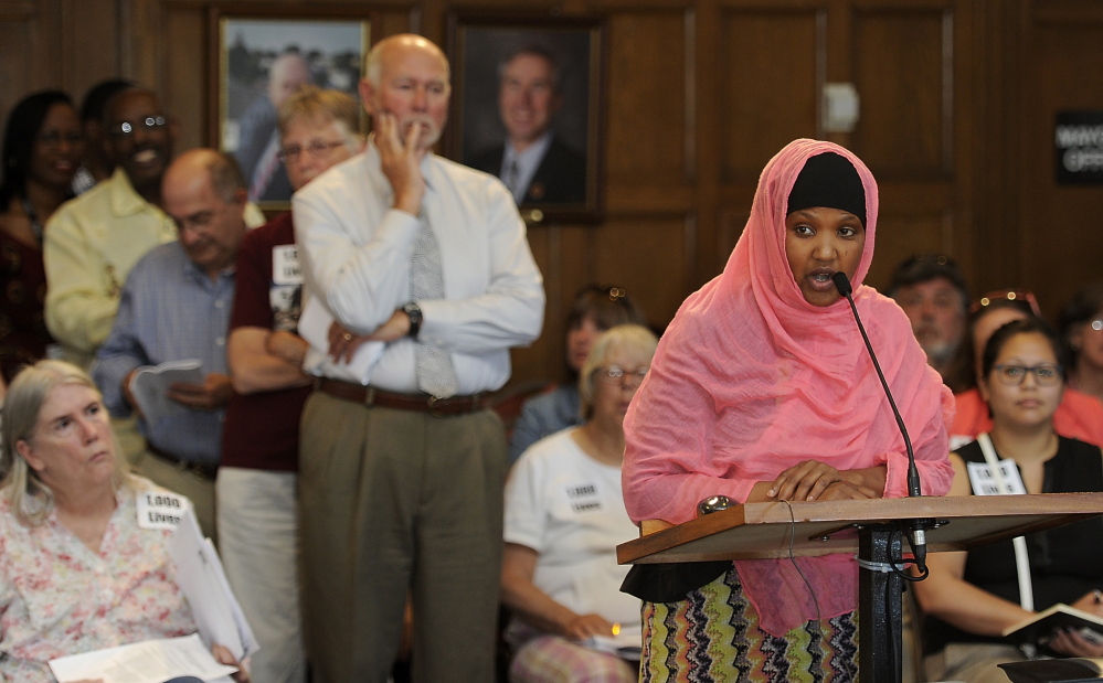Fatuma Hussein, executive director of United Somali Women of Maine, speaks to the Portland City Council hours before it voted on the budget.