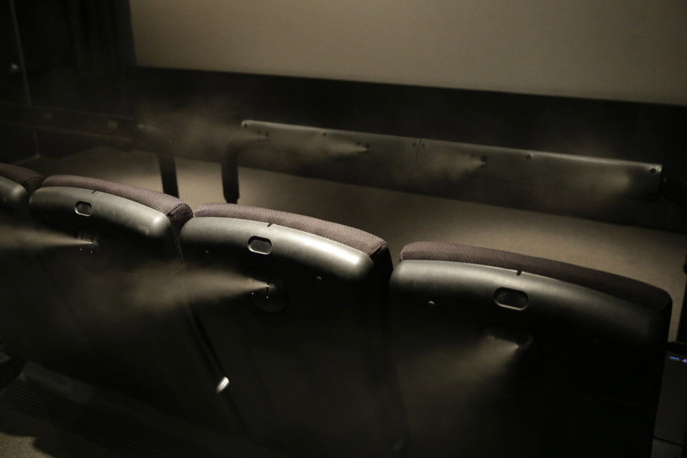 Motion seats that sway and jostle viewers, tickle legs and spray mist are coming to more movie theaters.
