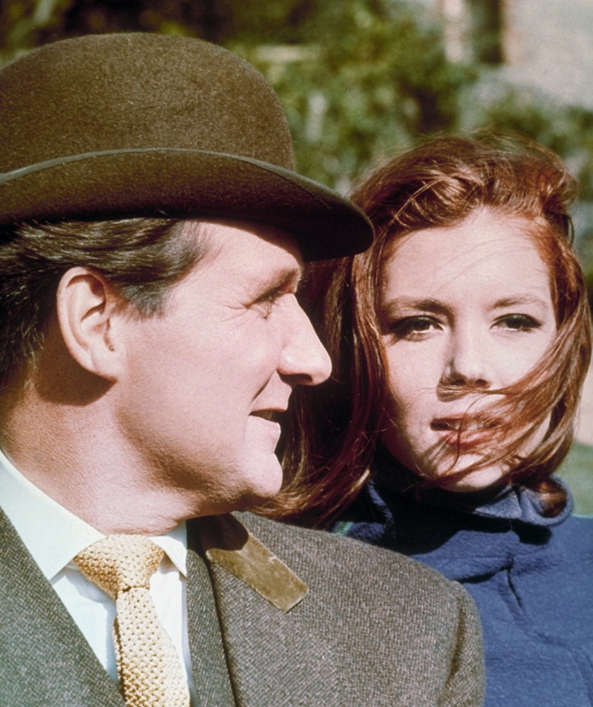 Patrick Macnee and Diana Rigg appear as British secret agents John Steed and Emma Peel in a scene from “The Avengers.” Macnee’s movie work includes a memorable comic turn in “This is Spinal Tap.”