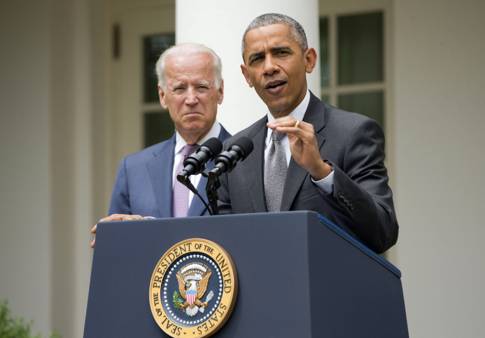 President Obama, accompanied by Vice President Joe Biden, speaks in the White House Rose Garden on Thursday after the Supreme Court ruling on the Affordable Care Act.